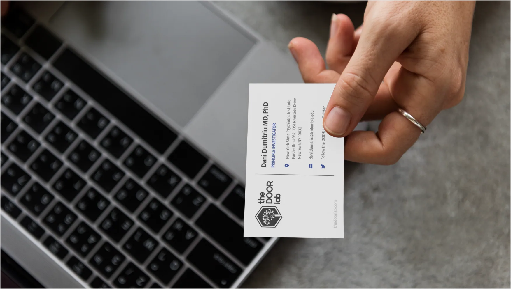 The DOOR Lab business card for Dr. Dani Dumitriu, principal investigator.
